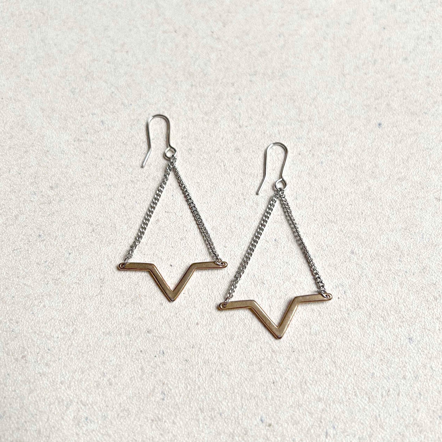 Aretes colgantes triangulo cadena media estrella